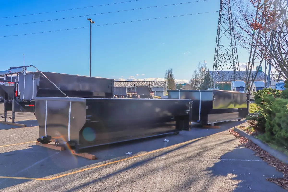 Roll-off dumpster ready for waste disposal at job site for 20 Yard Dumpster Rental in Livingston